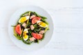 Warm salad with green beans, tuna, tomatoes and boiled eggs Royalty Free Stock Photo