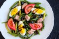 Warm salad with green beans, tuna, tomatoes and boiled eggs Royalty Free Stock Photo