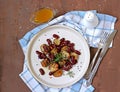 Warm salad of grilled Jerusalem artichoke and boiled red beans with olive oil and vinegar dressing on a white clay plate Royalty Free Stock Photo