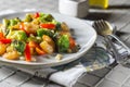 Warm salad of shrimp, broccoli and paprika