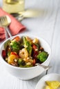 Warm salad of shrimp, broccoli and paprika