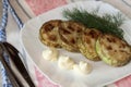 Fried marrows with mayonnaise on a plate Royalty Free Stock Photo