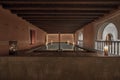 Warm saltwater pool with gazebos, wooden balustrades, and large candles