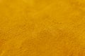 Warm soft yellow plaid surface close up. Synthetic cloth texture Royalty Free Stock Photo