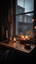 Warm still life with burning candles on a wooden table in the window.