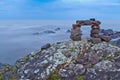 Rock cairn on the lakeshore