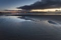 Warm sundown over sand beach