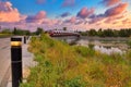 Warm Sunrise Over The Peace Bridge And River