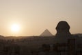 Warm sunset at The Great Pyramids of Egypt Royalty Free Stock Photo