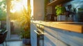 Warm Sunset Light in a Cozy Kitchen Interior. Generative ai Royalty Free Stock Photo