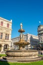 Warm sunset over busy with tourists famous Graben shopping street near Stephans square Stephansplatz with a horse drawn carriage