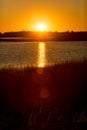 Warm sunset over the marsh at Milford Point, Connecticut. Royalty Free Stock Photo