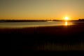 Warm sunset over the marsh at Milford Point, Connecticut. Royalty Free Stock Photo