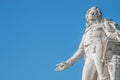 Warm sunset over Mozart monument in front of Palmenhaus, near Neue Burg and Hofburg Palaces garden, in historical downtown of