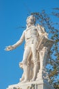 Warm sunset over Mozart monument in front of Palmenhaus, near Neue Burg and Hofburg Palaces garden, in historical downtown of