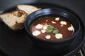 Warm tomato soup bowl and bread Royalty Free Stock Photo