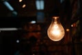 Warm tone old style hanging light bulb decoration Royalty Free Stock Photo