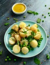 Warm vegetarian new baby potato salad with petit pois peas, Dijon mustard and capers dressing, served with fresh dill