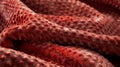 The warm velvety feel of a rustic red throw featuring tiny raised dots that add dimension to the already cozy texture