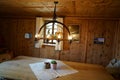 Warm welcoming cozy wooden tyrol hutte inside in the tyrol alm