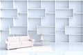 Warm white room decor with shelves wall, tile floor, carpet, branch.