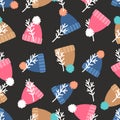 Warm winter hats with pompon seamless pattern