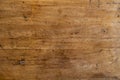 Warm wooden texture photo. Timber board with weathered crack flat lay. Rustic wooden table top view