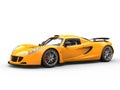 Warm yellow modern supercar - side view Royalty Free Stock Photo