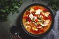 Warming autumn soup with red lentils, chicken fillet, vegetables, spices and paprika, comfort food. Green table, top view Royalty Free Stock Photo