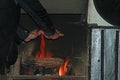 Warming hands on a log fire