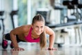 Warming up and doing some push ups a the gym Royalty Free Stock Photo