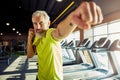 Warming up. Focused mature man in sportswear boxing, while working out at gym, focus on male face Royalty Free Stock Photo