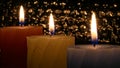 The warmth of candles burning for the upcoming Christmas