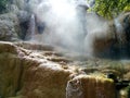 The warmth of a sulfur waterfall at Lokawisata Baturraden, Central Java, Indonesia, September 2018 Royalty Free Stock Photo