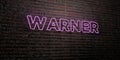 WARNER -Realistic Neon Sign on Brick Wall background - 3D rendered royalty free stock image