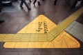 Warning block for safety of the blind and decoration on subway floor with people walk in rush hour