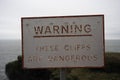 Warning these cliffs are dangerous sign Royalty Free Stock Photo