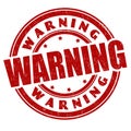 Warning grunge rubber stamp Royalty Free Stock Photo