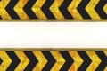 Warning hazard grunge pattern in yellow and black color on white background Royalty Free Stock Photo