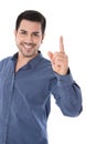 Warning: isolated smiling man pointing with his forefinger