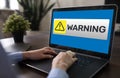 Warning message sign on screen. Virus detection security breathe hardware or software trouble. cyber security concept. Royalty Free Stock Photo