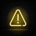 Warning neon text and triangle sign with exclamation mark. Caution design