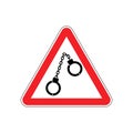 Warning police. Handcuffs on red triangle. Road sign attention