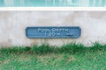 Warning pool depth sign by swimming pool Royalty Free Stock Photo