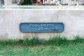 Warning pool depth sign by swimming pool Royalty Free Stock Photo