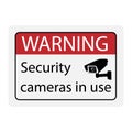 Warning Security cameras in use sign