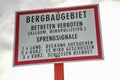 Warning sign at an active mine giving information about blasting and explosives