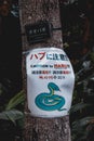 Warning sign against dangerous poisonous Japanese Okinawa snake Habu