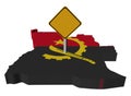 Warning sign on Angola map flag Royalty Free Stock Photo