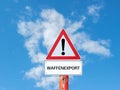 Warning sign arms export on blue background in german Royalty Free Stock Photo